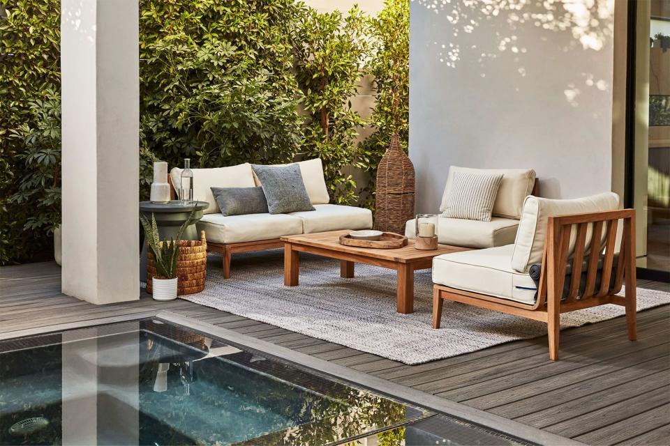 <p><a href="https://go.redirectingat.com?id=74968X1596630&url=https%3A%2F%2Fliveouter.com%2Fproducts%2Fmodular-seating-teak-outdoor-loveseat-with-armless-chairs-four-seat%2Fpalisades-cream&sref=https%3A%2F%2Fwww.townandcountrymag.com%2Fstyle%2Fhome-decor%2Fg60550708%2Fbest-outdoor-furniture-sets%2F" rel="nofollow noopener" target="_blank" data-ylk="slk:Shop Now;elm:context_link;itc:0;sec:content-canvas" class="link ">Shop Now</a></p><p>Teak Loveseat with Chair Set</p><p>liveouter.com</p><p>$5814.00</p>