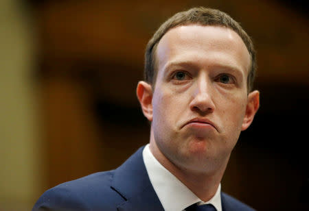 FILE PHOTO: Facebook CEO Mark Zuckerberg testifies before a House Energy and Commerce Committee hearing regarding the company's use and protection of user data on Capitol Hill in Washington, U.S., April 11, 2018. REUTERS/Leah Millis/File Photo