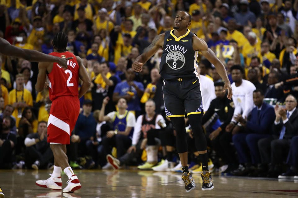 OAKLAND, CALIFORNIA - JUNE 13:  Andre Iguodala #9 of the Golden State Warriors celebrates the play against the Toronto Raptors in the second half during Game Six of the 2019 NBA Finals at ORACLE Arena on June 13, 2019 in Oakland, California. NOTE TO USER: User expressly acknowledges and agrees that, by downloading and or using this photograph, User is consenting to the terms and conditions of the Getty Images License Agreement. (Photo by Ezra Shaw/Getty Images)