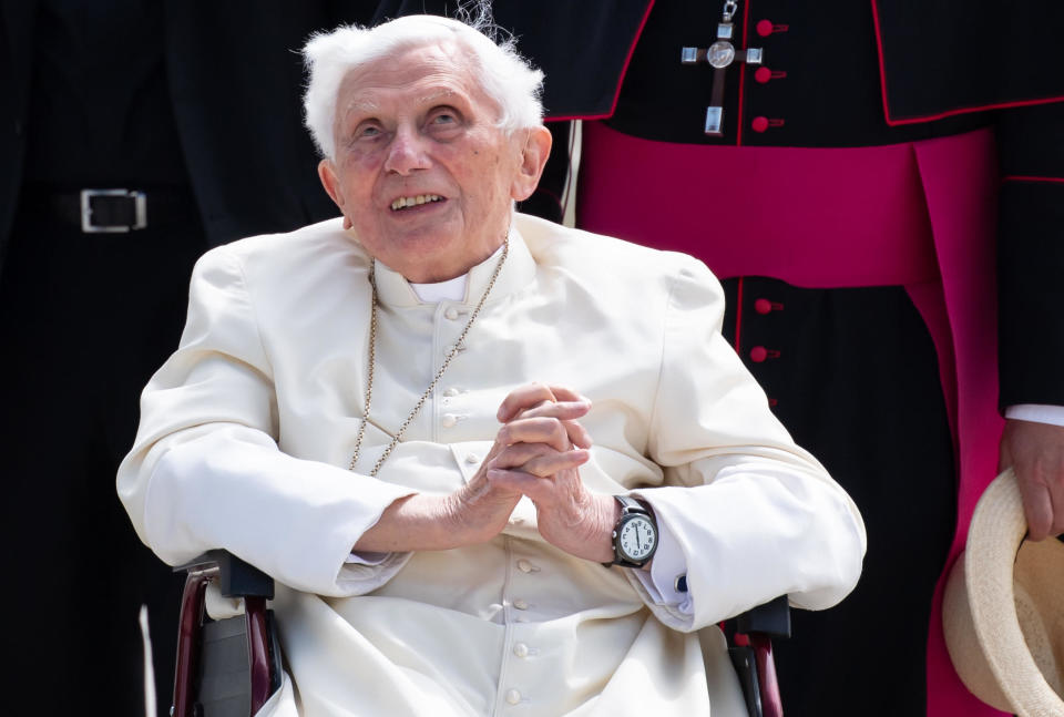 Pope Emeritus Benedict XVI in a wheelchair at the airport in Munich, Germany, on June 22, 2020, as he prepared to return to the Vatican following a visit to his sick brother. / Credit: SVEN HOPPE/POOL/AFP/Getty