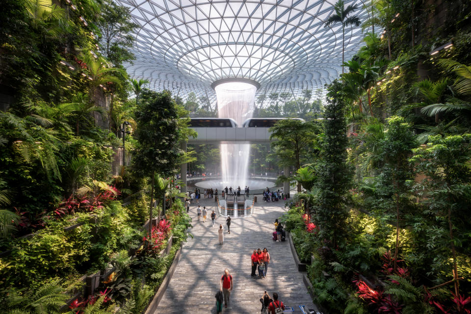 SINGAPORE - Sep 26, 2019: The Rain Vortex, a 40m-tall indoor waterfall located inside the Jewal Changi Airport in Singapore. Jewel Changi Airport.