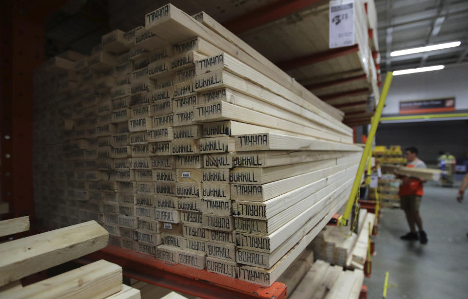 FILE - In this July 11, 2019, file photo lumber is stacked at the Home Depot store in Londonderry, N.H. On Thursday, Aug. 15, the Commerce Department releases U.S. retail sales data for July. (AP Photo/Charles Krupa, File)