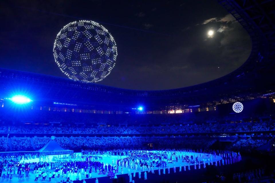 <p>A drone display flew over the Olympic Stadium. </p>