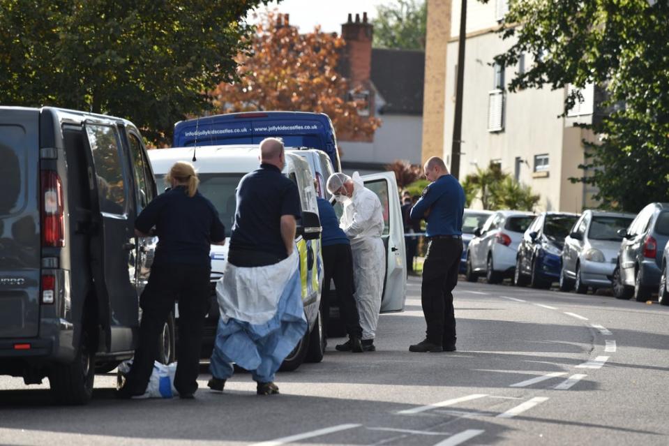 Police officers in forensic suits at the Belfairs Methodist Church in Eastwood Road North (Nick Ansell/PA) (PA Wire)