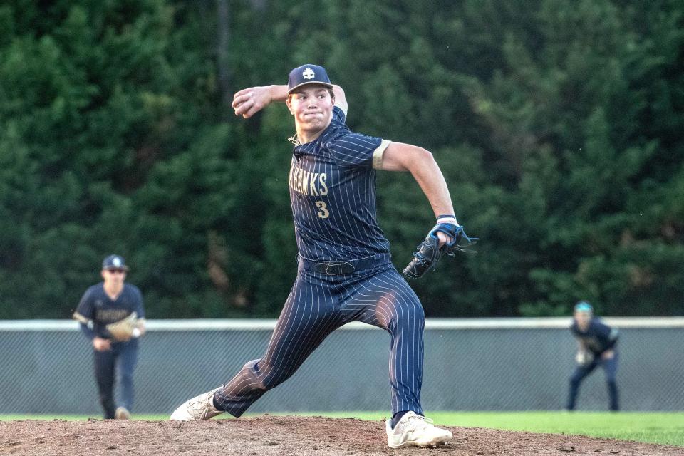 Delaware Military Academy senior Tyler August (3) winds up for a pitch against Caravel Academy during the boys baseball game at Caravel in Bear, Thursday, May 11, 2023. Caravel won 1-0.