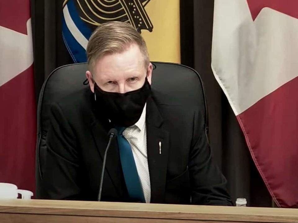 Education Minister Dominic Cardy outlined plans for a return to in-class learning on Monday, including installation of HEPA filter units in dozens of schools and KN95 masks for teachers. (Government of New Brunswick/YouTube - image credit)