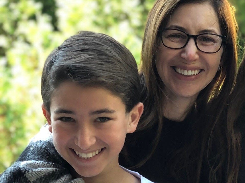 Rose Bronstein poses with her son, Nate, who died by suicide at the age of 15.