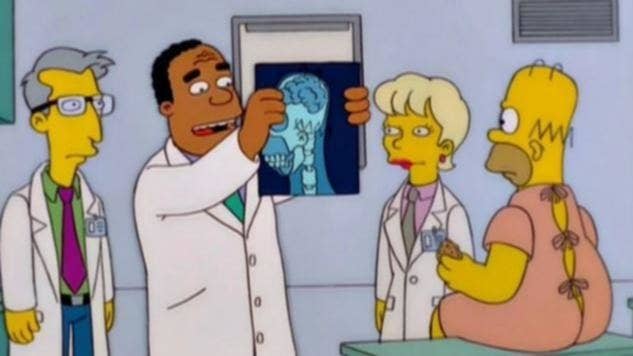 Doctor holding up Homer Simpson's x-rays