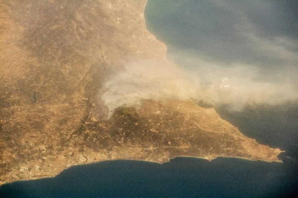 <p>Images released by the European Space Agency appear to show that the fire — which began on Friday in the eucalyptus and pine forests in the hills on Monchique — is visible from the International Space Station (Photo: Alexander Gerst/AFP) </p>