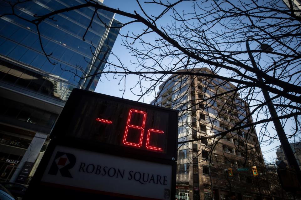 A sign displaying the temperature is pictured during during a period of cold weather in Vancouver, British Columbia on Friday, January 12, 2024. 