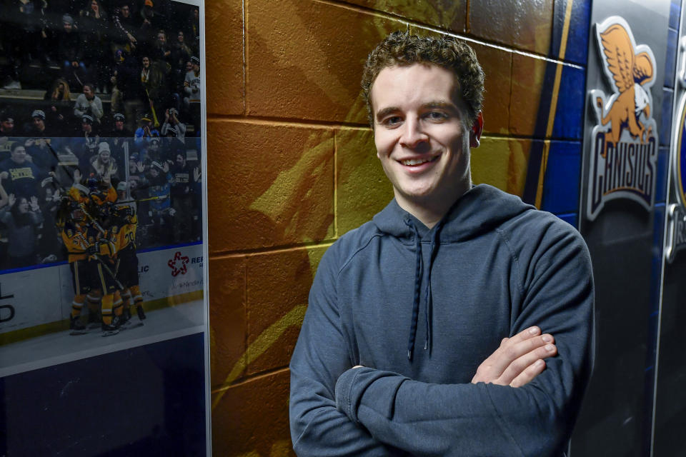 Canisius left wing Alton McDermott after an NCAA hockey practice in Buffalo, N.Y., Thursday, Jan. 26, 2023. McDermott's grandfather, former NHLer Paul Henderson, scored the decisive goal in clinching Canada its Summit Series win over Russia some 50 years ago and will celebrate his 80th birthday with a ceremonial puck drop before Cansius' game against Niagara. (AP Photo/Adrian Kraus)