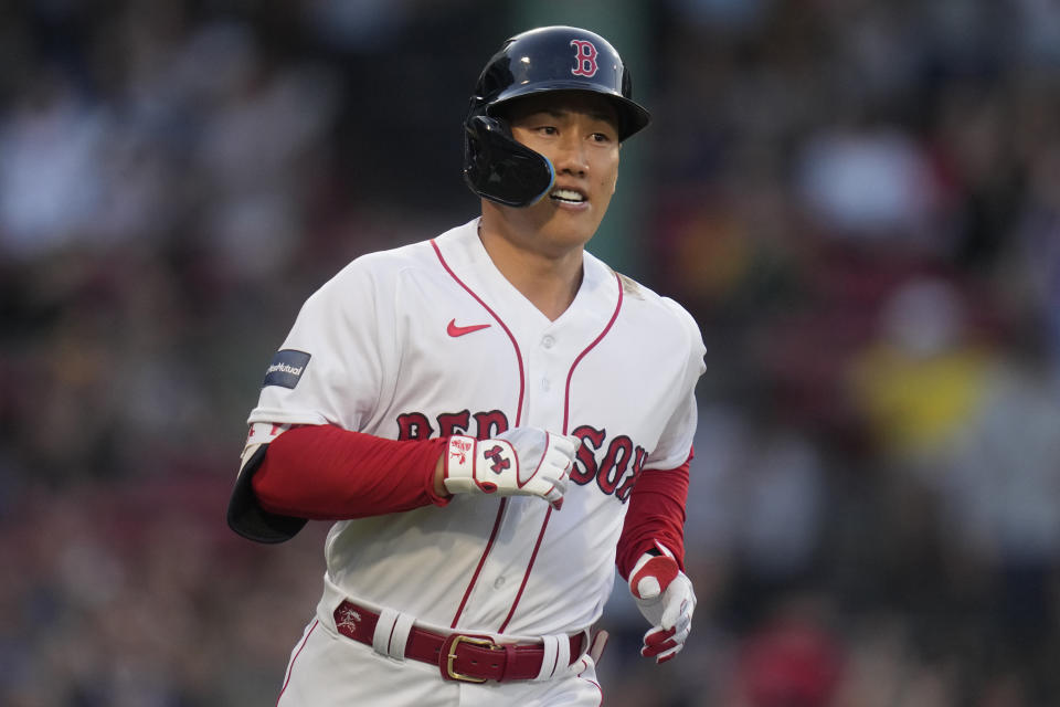 Boston Red Sox's Masataka Yoshida heads to first on a solo home run against the Cincinnati Reds during the second inning of a baseball game at Fenway Park, Wednesday, May 31, 2023, in Boston. (AP Photo/Charles Krupa)