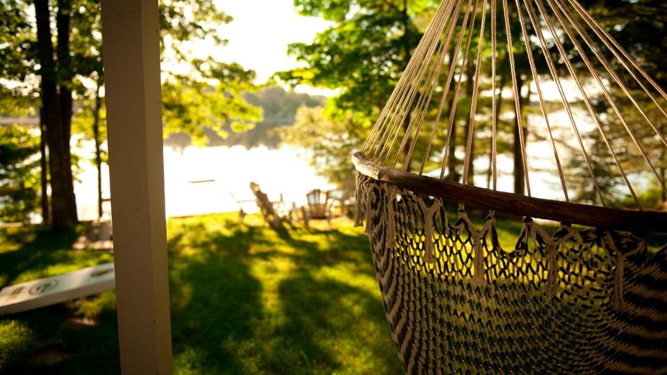 Hammock by the lake stock photo