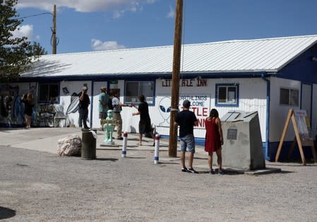 Attendees arrive at the Little A'Le'Inn as an influx of tourists responding to a call to 'storm' Area 51, a secretive U.S. military base believed by UFO enthusiasts to hold government secrets about extra-terrestrials, is expected in Rachel, Nevada