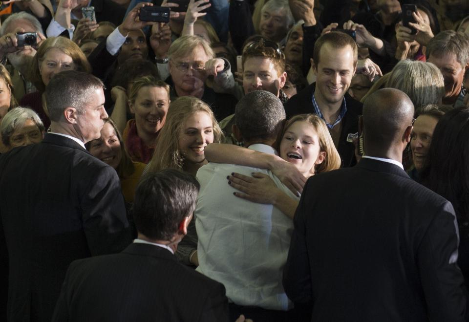 President Barack Obama greets supporters after speaking on the economy at Boise State University in Boise, Idaho, January 21, 2015. Obama is traveling on a two-day, two-state trip to Idaho and Kansas following his State of the Union address.