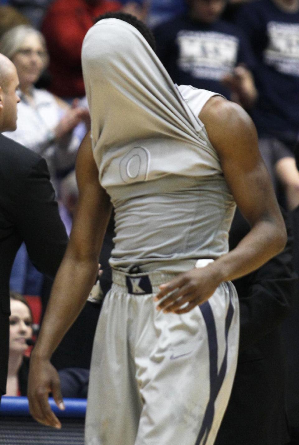 Xavier guard Semaj Christon walks off the court after Xavier lost to North Carolina State 74-59 in a first-round game of the NCAA college basketball tournament, Tuesday, March 18, 2014, in Dayton, Ohio. (AP Photo/Skip Peterson)