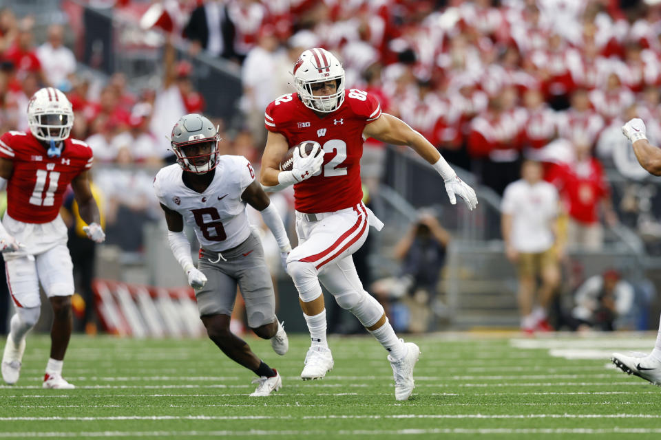 Sep 10, 2022; Madison, Wisconsin, USA; Wisconsin Badgers tight end Jack Eschenbach (82) rushes with the football during the third quarter against the Washington State Cougars at Camp Randall Stadium. Mandatory Credit: Jeff Hanisch-USA TODAY Sports