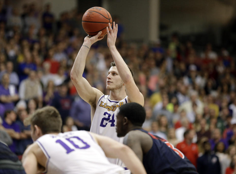 Lipscomb guard Garrison Mathews (24) shoots a free throw against Liberty in the second half of the Atlantic Sun NCAA college basketball tournament championship game Sunday, March 10, 2019, in Nashville, Tenn. Mathews led all scorers with 21 points but Liberty won 74-68. (AP Photo/Mark Humphrey)