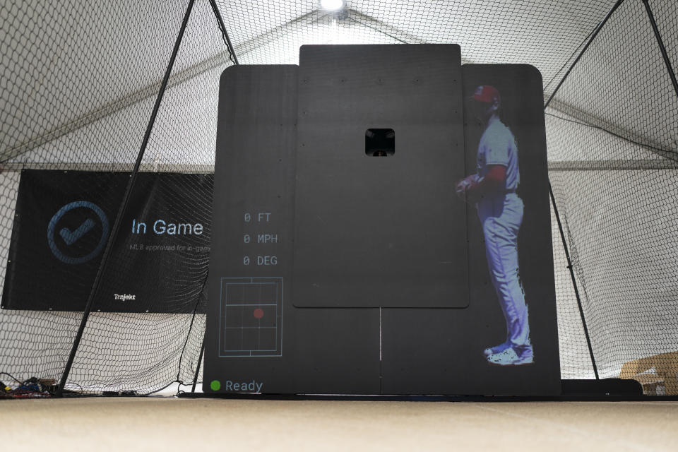 The Trajekt Arc pitching machine is demonstrated during the Major League Baseball winter meetings Wednesday, Dec. 6, 2023, in Nashville, Tenn. (AP Photo/George Walker IV)