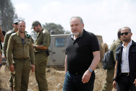 FILE PHOTO: Israeli Defence Minister Avigdor Lieberman visits an army drill in the Israeli-occupied Golan Heights near the border with Syria, August 7, 2018. REUTERS/Amir Cohen/File Photo