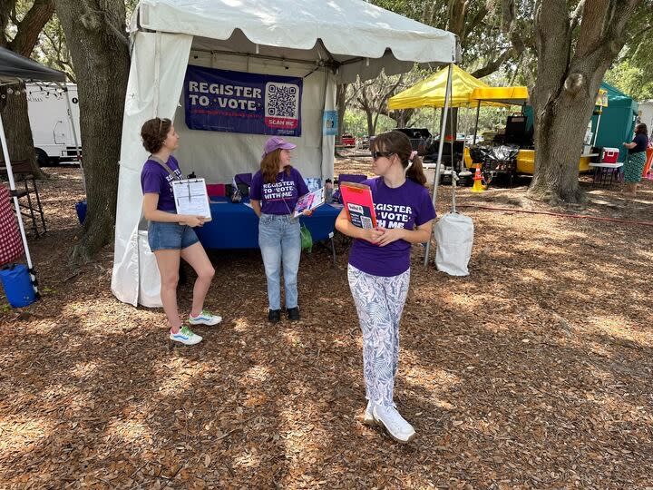 People Power for Florida organizers Allison Minnerly, Roxanne Perret and Rachel Gersenberger register voters in Orlando, Florida 