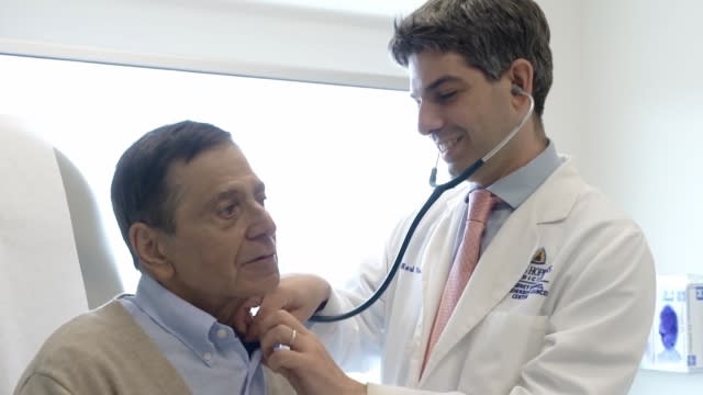 Jerry Fontana getting his vitals taken by Dr. Mark Yarchoan