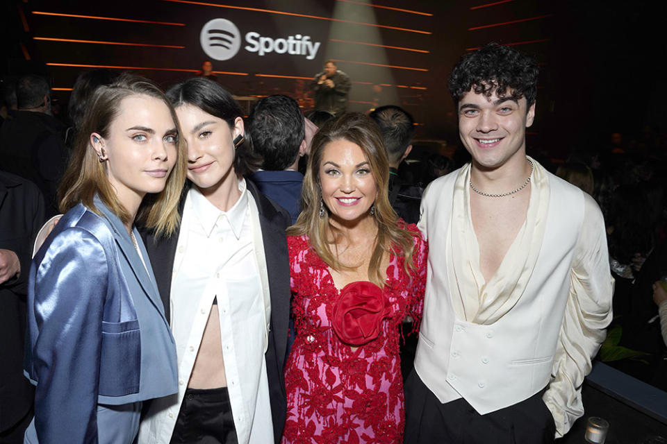 Cara Delevingne, Gracie Abrams, Dustee Jenkins, Chief Public Affairs Officer, Spotify, and Alexander Stewart attend Spotify's 2024 Best New Artist Party at Paramount Studios on February 01, 2024 in Los Angeles, California.