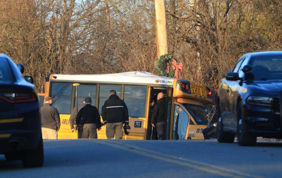 New York State Police investigate the scene of a crash between an Arlington Central School District bus and a New York State Police cruiser in LaGrange on March 8, 2022. 