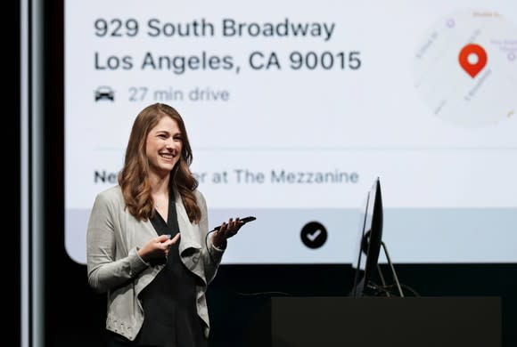 Kinberly Beverett on stage at an Apple event.