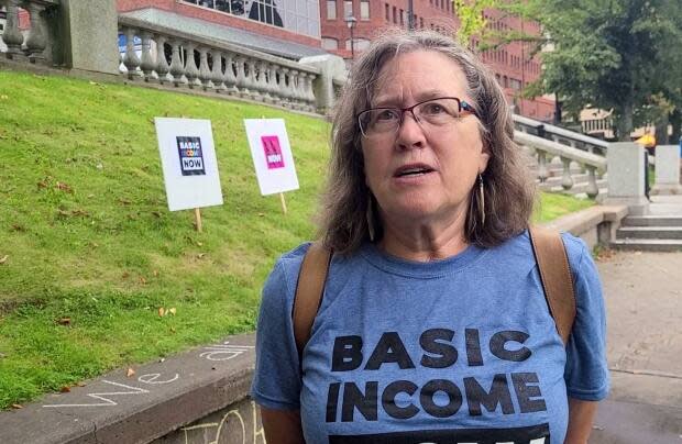 Mandy Kay-Raining Bird, chair of Basic Income Nova Scotia, speaks during a rally at Halifax's Grand Parade on Saturday. (Haley Ryan/CBC - image credit)