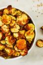 <p>How thinly you slice your courgette will affect how long it'll take in the oven. We recommend checking on the crisps after about an hour, though it'll almost definitely take longer than that. </p><p>Get the <a href="https://www.delish.com/uk/cooking/recipes/a28977233/cool-ranch-zucchini-chips/" rel="nofollow noopener" target="_blank" data-ylk="slk:Courgette Crisps;elm:context_link;itc:0;sec:content-canvas" class="link ">Courgette Crisps</a> recipe.</p>