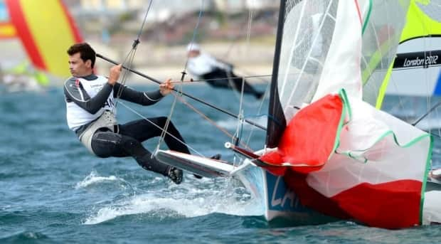 Toronto's Gordon Cook, left, and Vancouver's Hunter Lowden drop their spinnaker in the men's 49er sailing class at the Olympics in 2012. ( - image credit)