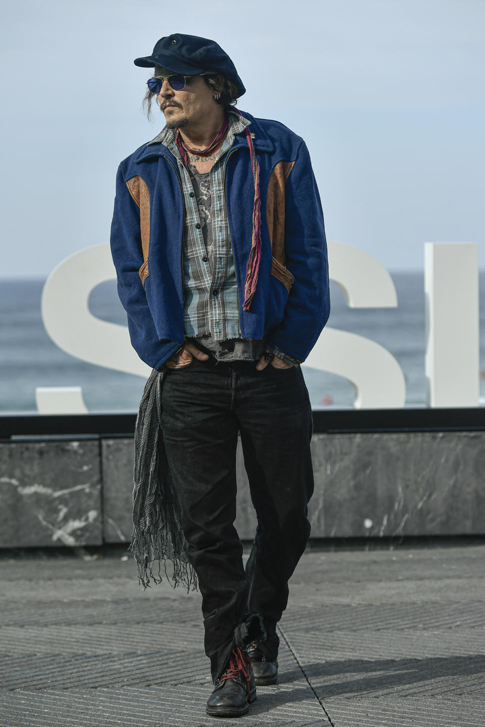 US actor Johny Deep poses during a photocall at the 69th San Sebastian Film Festival, in San Sebastian, northern Spain, Wednesday, Sept. 22, 2021. Johny Depp will be receiving on the night Donostia Award for his contribution to the cinema. (AP Photo/Alvaro Barrientos)