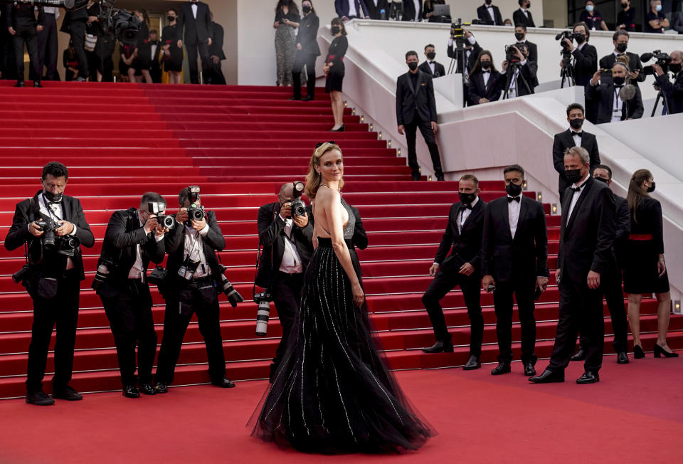 FILE - In this July 7, 2021 file photo Diane Kruger poses for photographers upon arrival at the premiere of the film 'Everything Went Fine' at the 74th international film festival, Cannes, southern France. (AP Photo/Brynn Anderson, File)