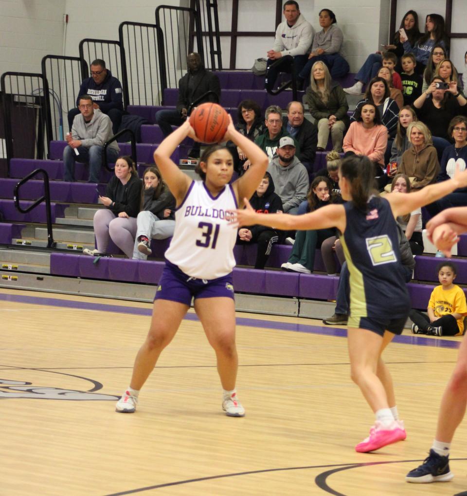 Candace Haley looks to make a pass in a game at Monty Tech on December 8, 2023.
