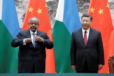 Chinese President Xi Jinping and Djibouti's President Ismail Omar Guelleh attend a signing ceremony at the Great Hall of the People in Beijing, China November 23, 2017. REUTERS/Jason Lee