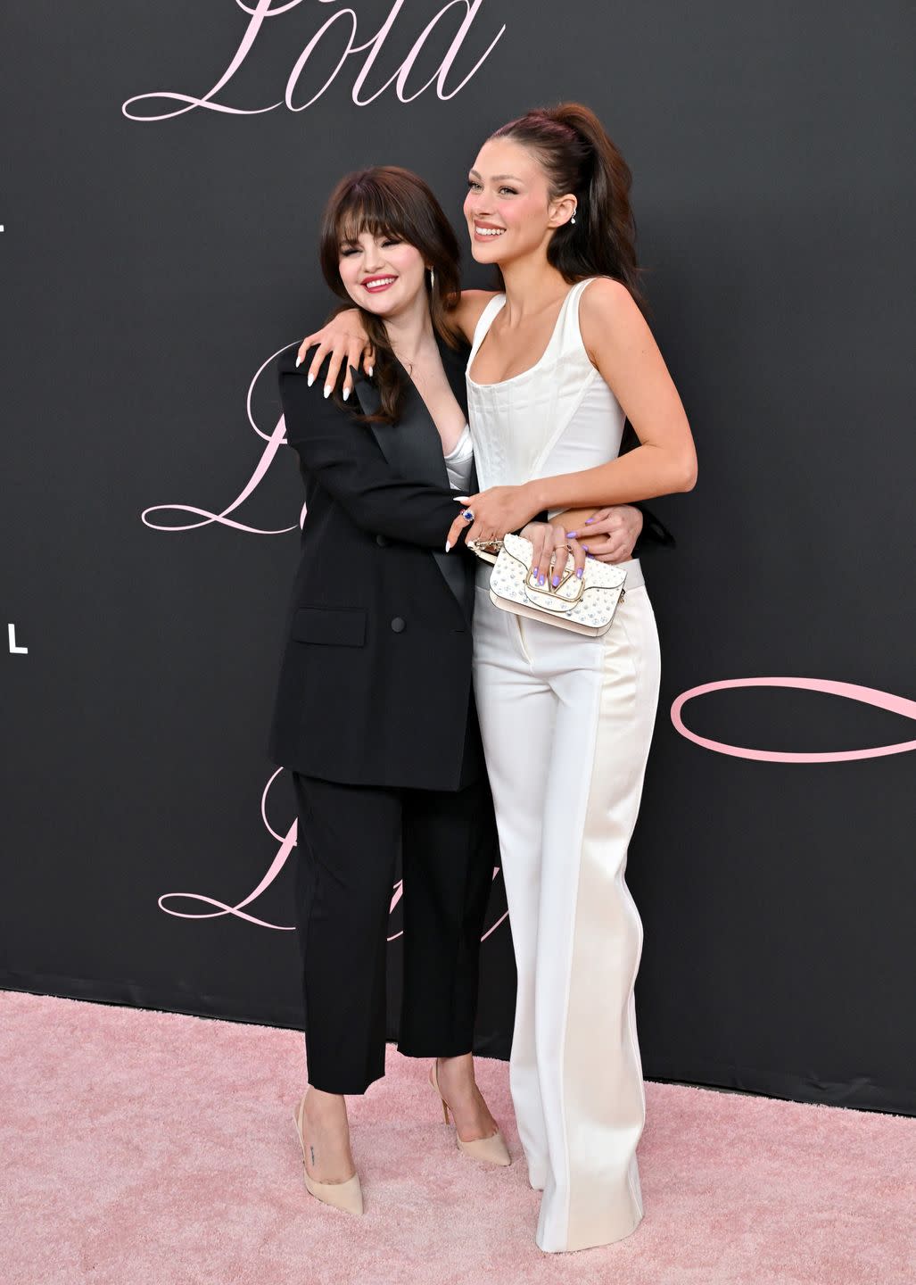 los angeles, california february 03 nicola peltz beckham and selena gomez attend the premiere of lola at regency bruin theatre on february 03, 2024 in los angeles, california photo by axellebauer griffinfilmmagic