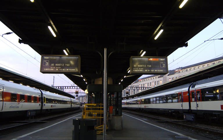 Two passenger trains at Geneva's main railway station on June 22, 2005. At least 17 people were injured when two passenger trains collided at a train station in northern Switzerland during morning rush hour, police said