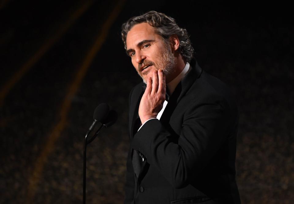 Joaquin Phoenix accepts the award for best performance by an actor in a leading role for his role in "Joker" during the 92nd Academy Awards at Dolby Theatre.