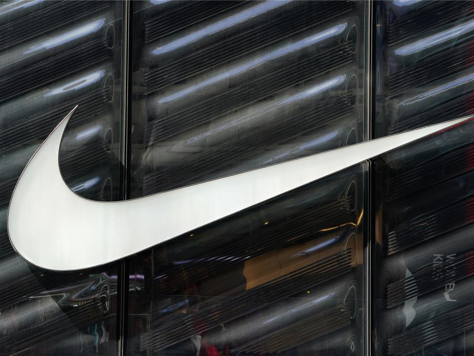 FILE PHOTO: The Nike swoosh logo is seen outside the store on 5th Ave in New York, New York, U.S., March 19, 2019.   REUTERS/Carlo Allegri