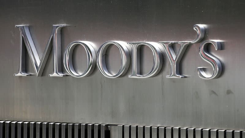 A sign for Moody’s Corp. is shown on Aug. 13, 2010, in New York. The credit rating agency downgraded 11 regional banks with a new report released on April 21, 2023.