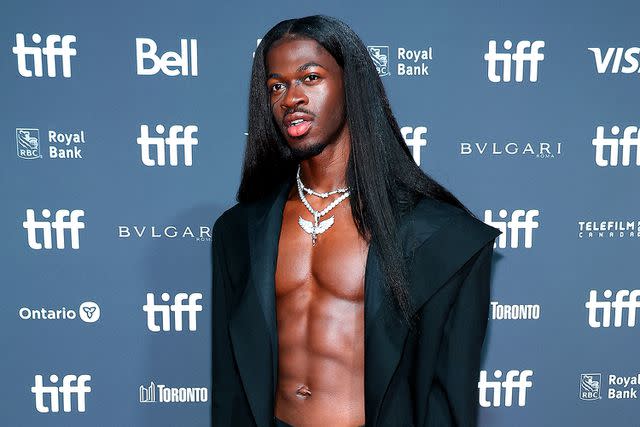 <p>Leon Bennett/WireImage</p> Lil Nas X at the premiere in Toronto on Sept. 9, 2023