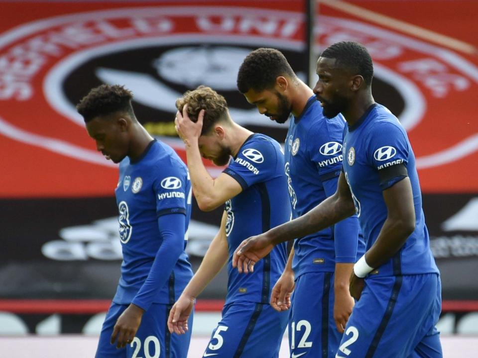 Chelsea players react at full-time after their defeat by Sheffield United: Reuters