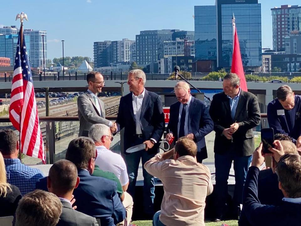 Nashville Mayor Freddie O'Connell shakes hands with Tennessee Gov. Bill Lee after a ribbon cutting to celebrate the reopening of Broadway Bridge in downtown Nashville on October 18, 2023.