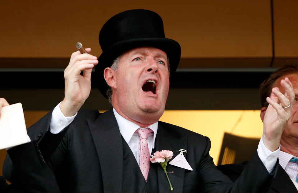 ASCOT, UNITED KINGDOM - JUNE 19: (EMBARGOED FOR PUBLICATION IN UK NEWSPAPERS UNTIL 24 HOURS AFTER CREATE DATE AND TIME) Piers Morgan smokes a cigar whilst watching the racing on day two of Royal Ascot at Ascot Racecourse on June 19, 2019 in Ascot, England. (Photo by Max Mumby/Indigo/Getty Images)