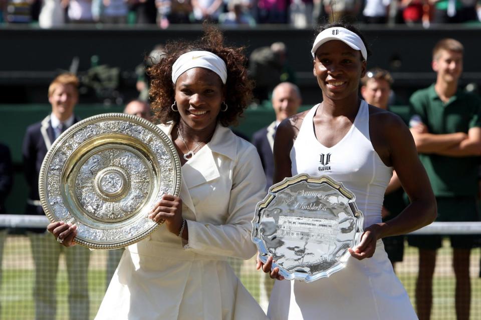 Serena Williams and Venus Williams after the 2009 Wimbledon women’s singles final (PA) (PA Archive)