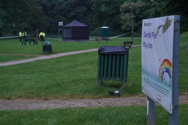 Police next to a black forensics tent in Grenfell Park, Maidenhead 