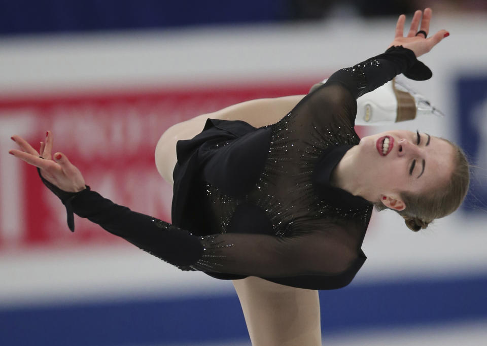 Carolina Kostner of Italy performs during women's free skating finals of the World figure skating championships in Saitama near Tokyo, Saturday, March 29, 2014. (AP Photo/Koji Sasahara)