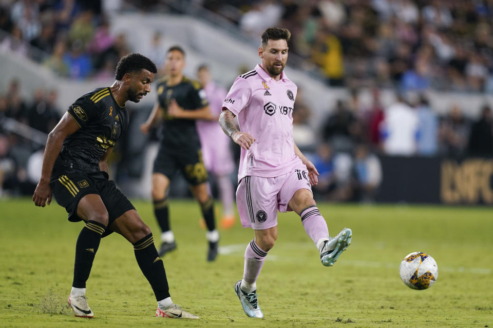 Inter Miami forward Lionel Messi (10) passes the ball against Los Angeles FC midfielder Timothy Tillman during the second half of an MLS soccer match, Sunday, Sept. 3, 2023, in Los Angeles. (AP Photo/Ryan Sun)