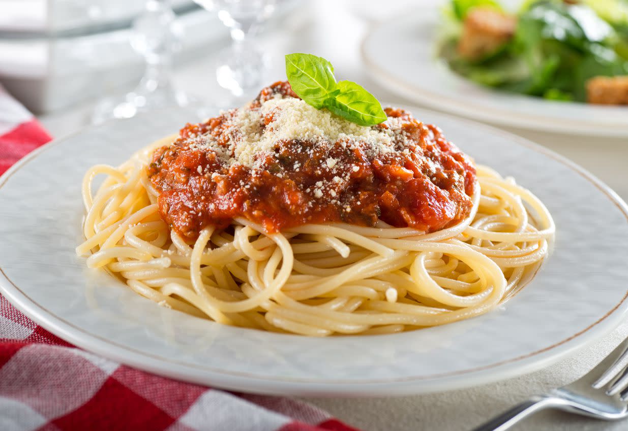 An image of a spaghetti dish in pasta sauce.